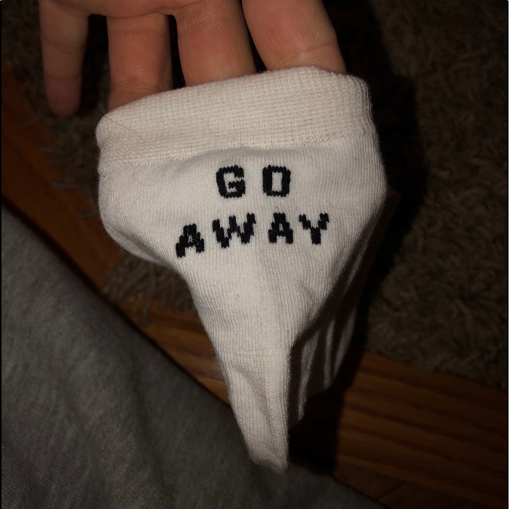 GO AWAY socks from Urban Outfitters
